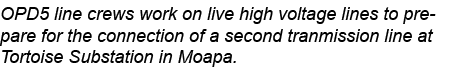 OPD5 line crews work on live high voltage lines to prepare for the connection of a second tranmission line at Tortois...